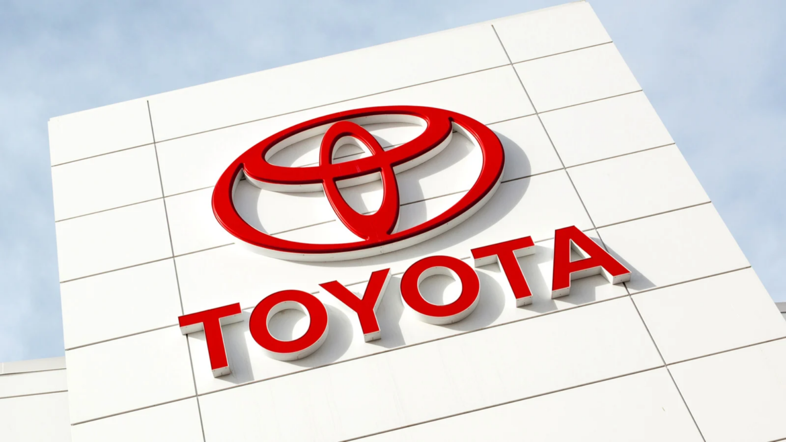 Imagem com a logomarca da Toyota