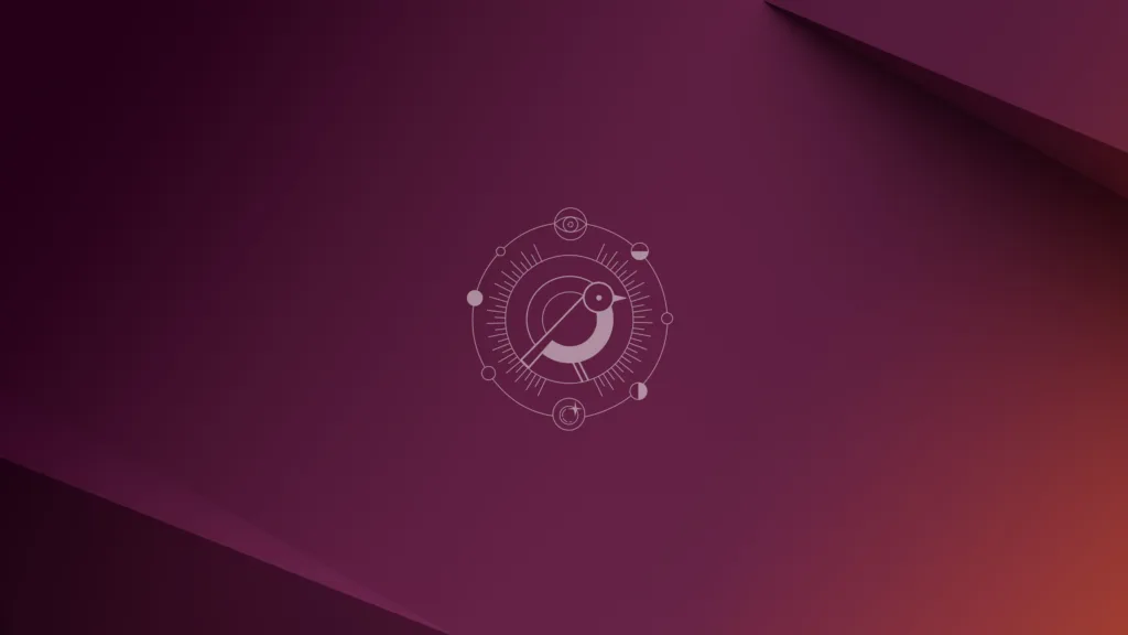 Wallpaper do Ubuntu 24.10 com fundo em tons roxos e laranjas, apresentando o mascote de pássaro Oriole no centro, cercado por um design geométrico minimalista.