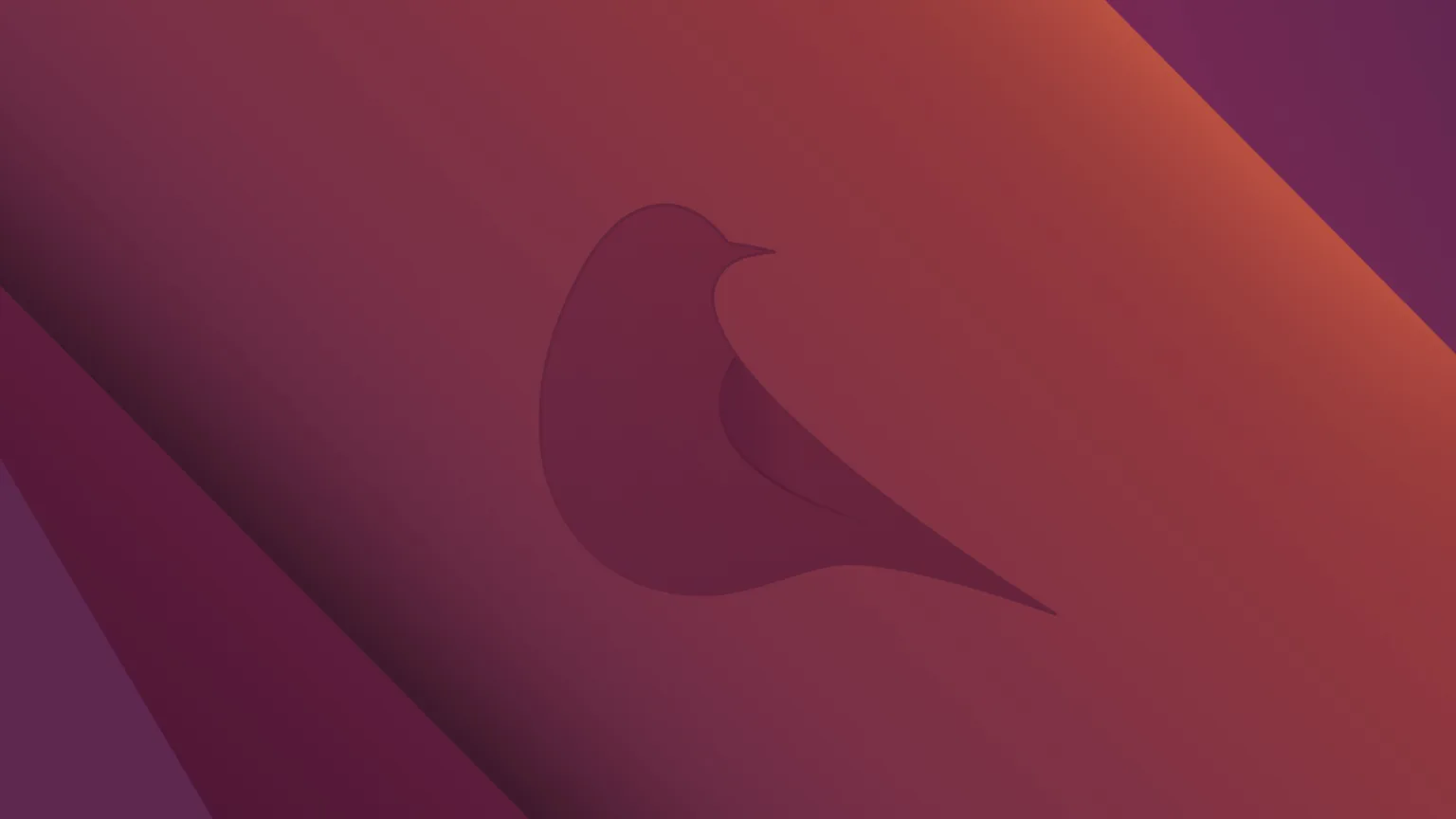 Ubuntu 24.10: lançado com kernel Linux 6.11 e mais novidades 1 Imagem destaque do lançamento do Ubuntu 24.10 Oracular Oriole com fundo gradiente vermelho e laranja, apresentando a silhueta de um pássaro estilizado.