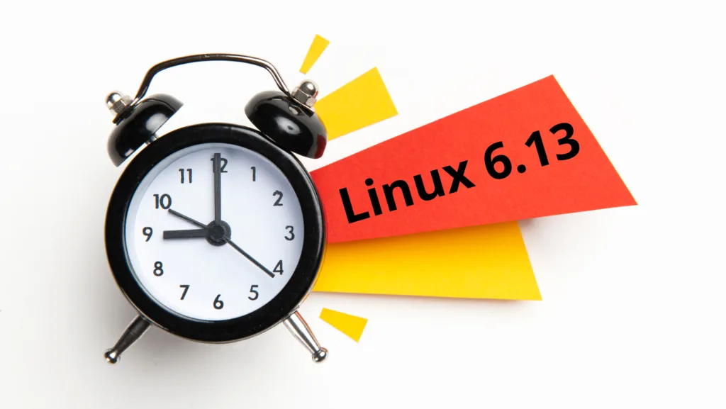 Relógio despertador marcando a hora com um papel colorido ao fundo escrito 'Linux 6.13', simbolizando a iminência do lançamento da nova versão do sistema.