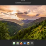 Captura de tela do ambiente de desktop GNOME no Solus 4.6, com um papel de parede de montanhas ao entardecer e uma barra inferior com ícones de aplicativos como Firefox e Celluloid.