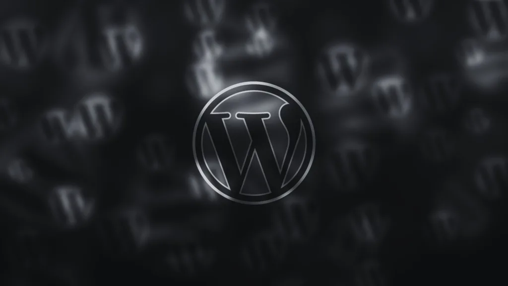 Logotipo do WordPress em tons de preto e cinza, sobre um fundo escuro com várias sombras do mesmo símbolo