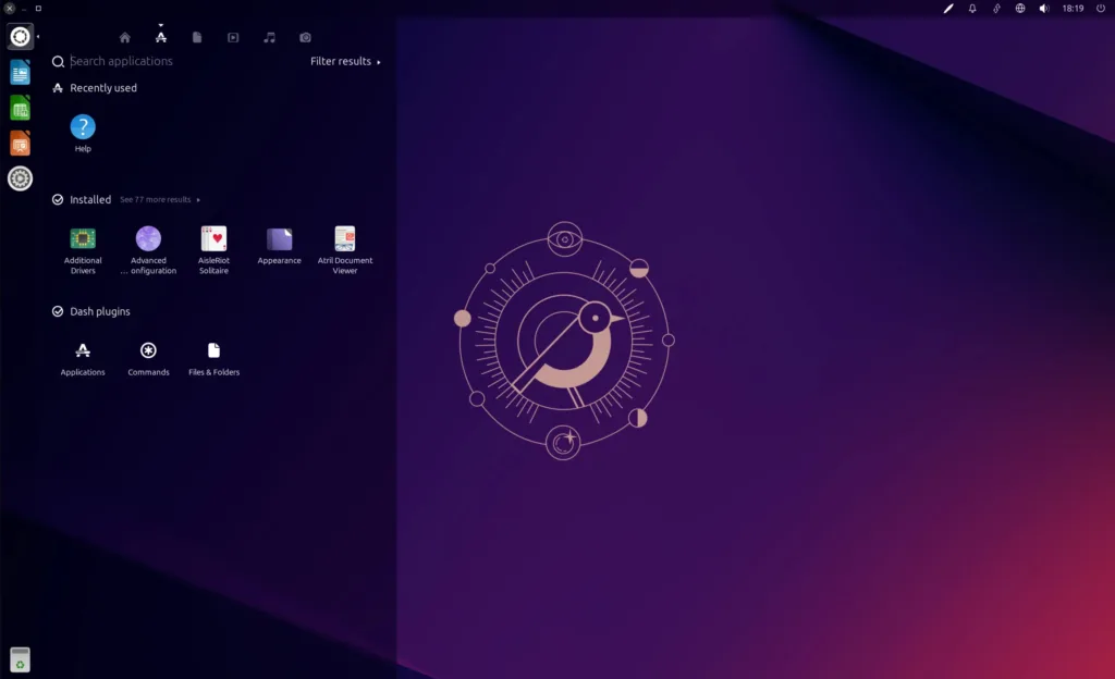 Captura de tela do Ubuntu Lomiri 24.10 com o lançador de aplicativos aberto e ícones do sistema visíveis.