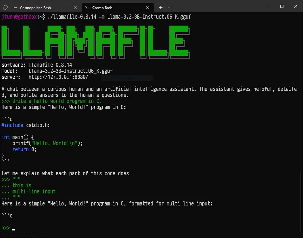 Captura de tela da interface de linha de comando (CLI) do Llamafile 0.8.14, mostrando o modelo Llama-3.2-3B-Instruct.Q6_K.gguf em execução com um exemplo de código 'Hello World' em C, realce de sintaxe e suporte a entrada de múltiplas linhas.