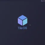 Tela inicial do TileOS com o logotipo do sistema no centro e indicadores de uso de CPU, memória e rede na parte superior da tela.