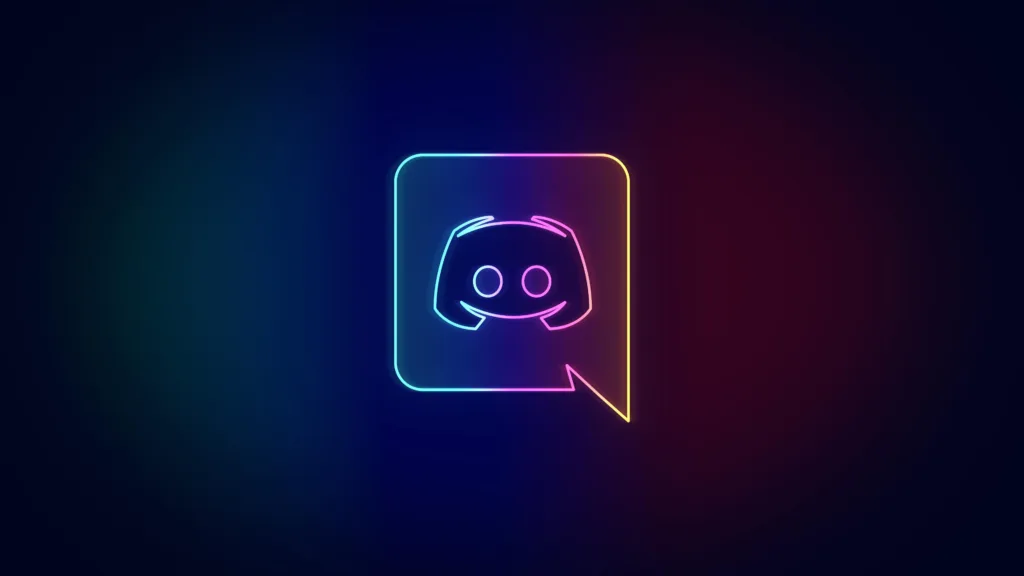 A imagem destaca o ícone do Discord em estilo neon, com contorno colorido em um fundo escuro, representando o logotipo do aplicativo de comunicação.