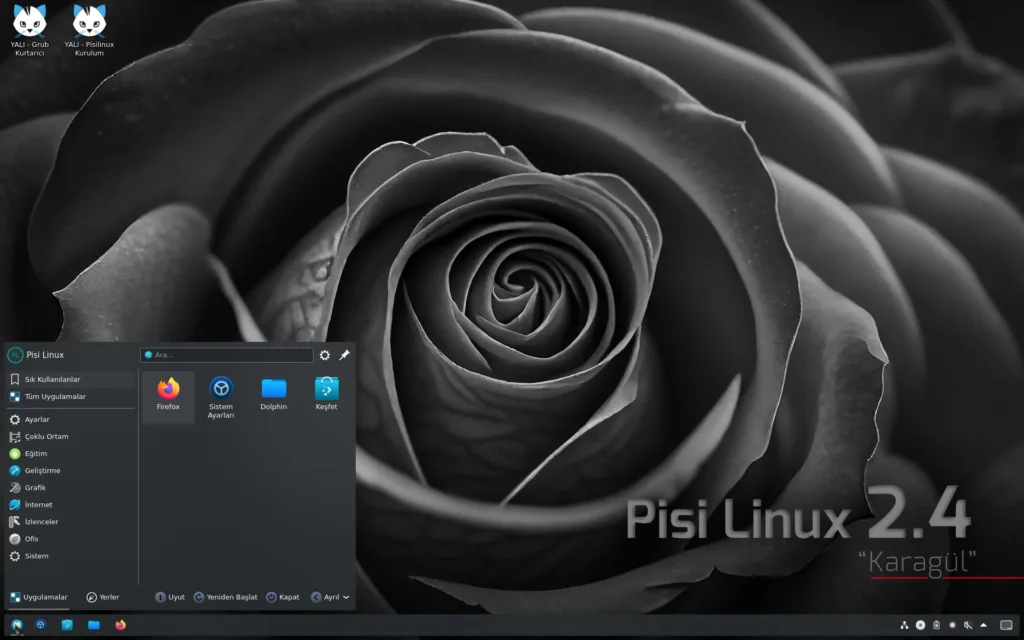 Captura de tela do Pisi Linux 2.4 Karagül com KDE Plasma 6, mostrando o menu de aplicativos aberto sobre uma imagem de fundo de uma flor negra, simbolizando a rara flor Karagül da região de Halfeti, na Turquia.