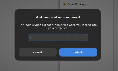 Imagem de autenticação de chaveiro: "Diálogo de autenticação para desbloqueio de chaveiro no Cinnamon, com os botões 'Cancelar' e 'Desbloquear'."