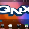 Tela inicial do sistema operacional QNX da BlackBerry, com ícones de navegador, mensagens, calendário e integração com o BlackBerry Bridge.