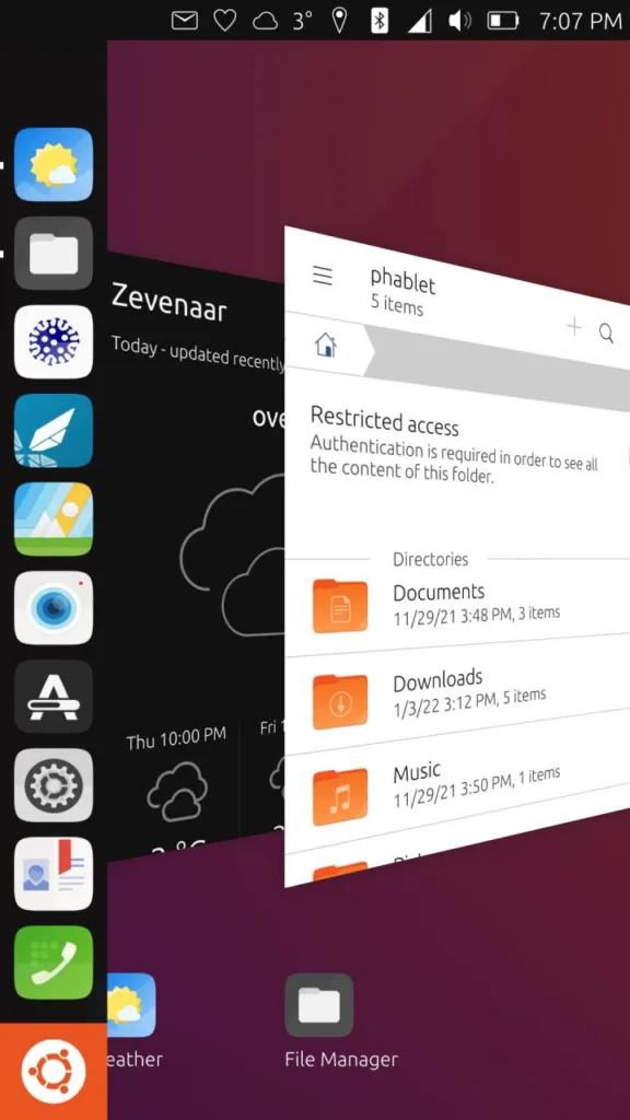 Interface do Ubuntu Touch mostrando aplicativos abertos em uma visão multitarefa, com o Gerenciador de Arquivos ativo e exigindo autenticação para acesso restrito a pastas. Ícones de aplicativos e informações do sistema são exibidos na lateral esquerda da tela.