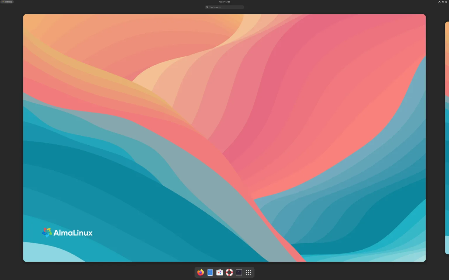 AlmaLinux 9.5 é lançado com novidades incríveis: confira agora 1 Tela inicial do AlmaLinux 9.5 com design colorido em tons de azul, rosa e laranja, mostrando o logotipo do AlmaLinux no canto inferior esquerdo e a barra de tarefas na parte inferior.