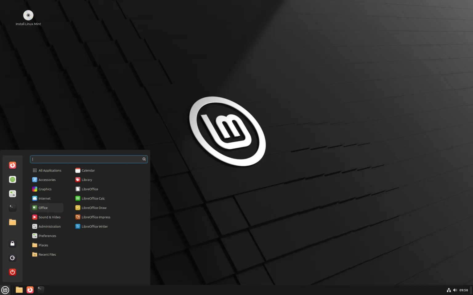 Linux Mint 22.1 beta: conheça as novidades da versão com Cinnamon 6.4 1 Tela inicial do Linux Mint 22.1 com tema escuro, logotipo centralizado, menu de aplicativos aberto no canto inferior esquerdo, mostrando categorias como LibreOffice, Internet e Administração.