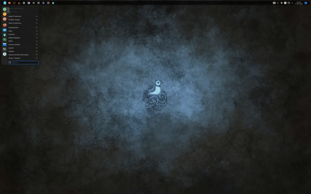 Logo do Ubuntu Studio 25.04 com fundo artístico representando criatividade multimídia