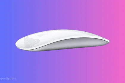 Foto do Apple Magic Mouse 2 USB-C conectado a um notebook Linux, com terminal exibindo uname -r e um ambiente gráfico ao fundo.