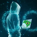 Hacker segurando notebook com mapa do Brasil, representando a ameaça do malware Shadow Vector.