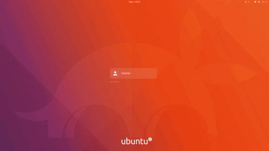 Tela de login do Ubuntu com gradiente roxo‑laranja Yaru, marco da evolução na guerra das cores Ubuntu