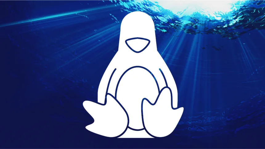 Logo do Linux submerso simbolizando o uso do Linux na deep web com foco em anonimato e privacidade