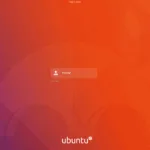 Tela de login do Ubuntu com gradiente roxo‑laranja Yaru, marco da evolução na guerra das cores Ubuntu