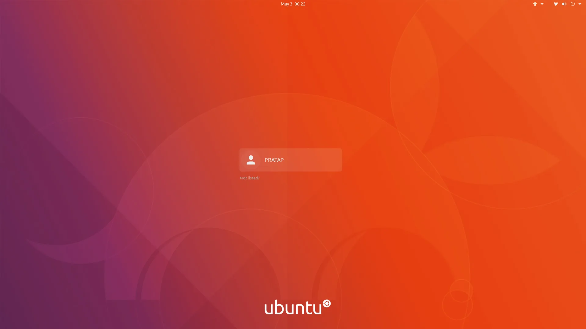 Tela de login do Ubuntu com gradiente roxo‑laranja Yaru, marco da evolução na guerra das cores Ubuntu
