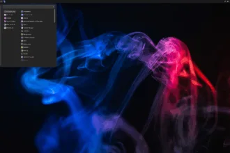 Screenshot do PorteuX 2.2 com o menu de aplicativos aberto em um ambiente desktop leve, sobre um papel de parede abstrato de fumaça azul e rosa