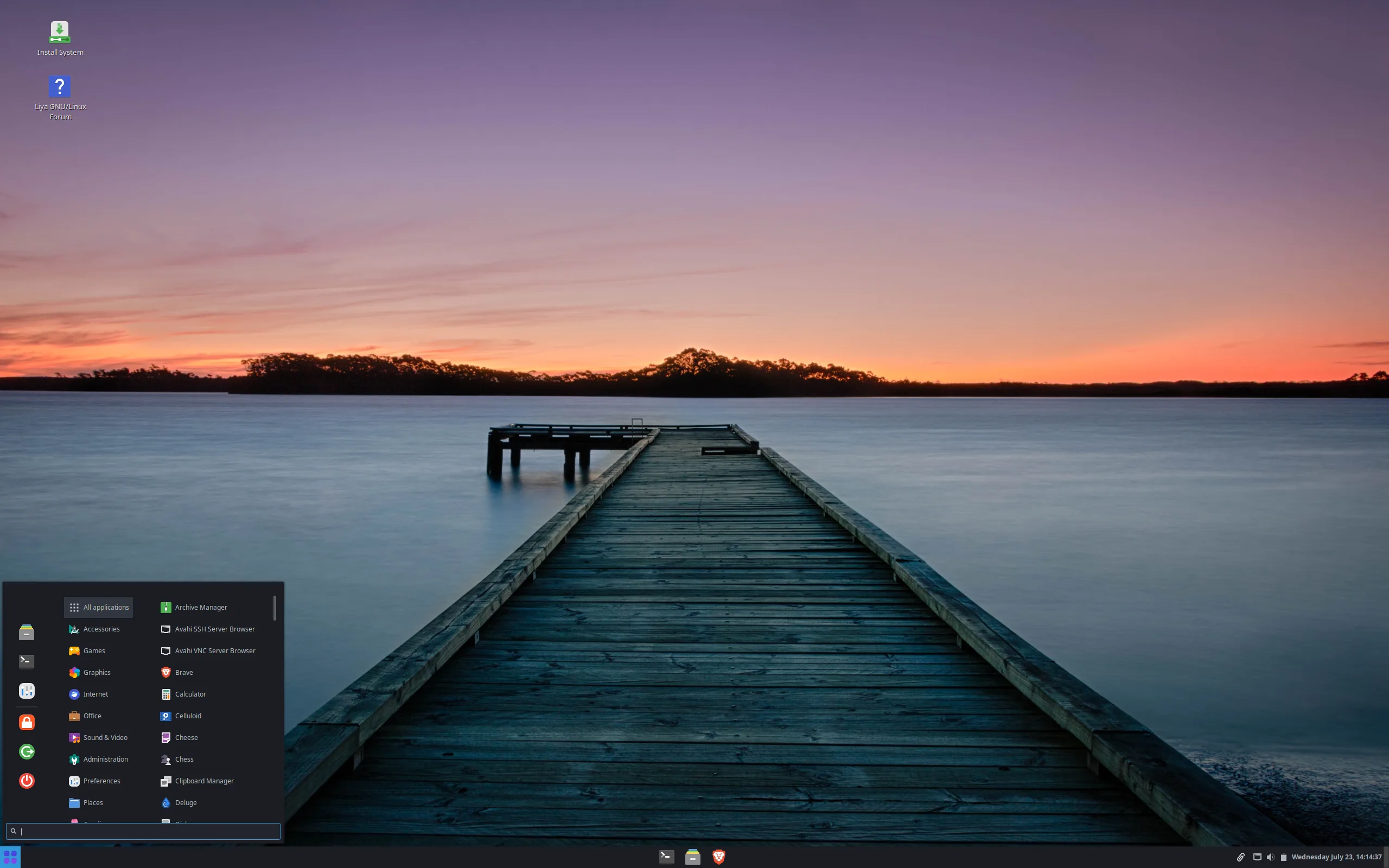 Área de trabalho padrão do Liya Linux 2.4 “Shravya” com papel de parede de pôr do sol, painel inferior e menu de aplicativos aberto